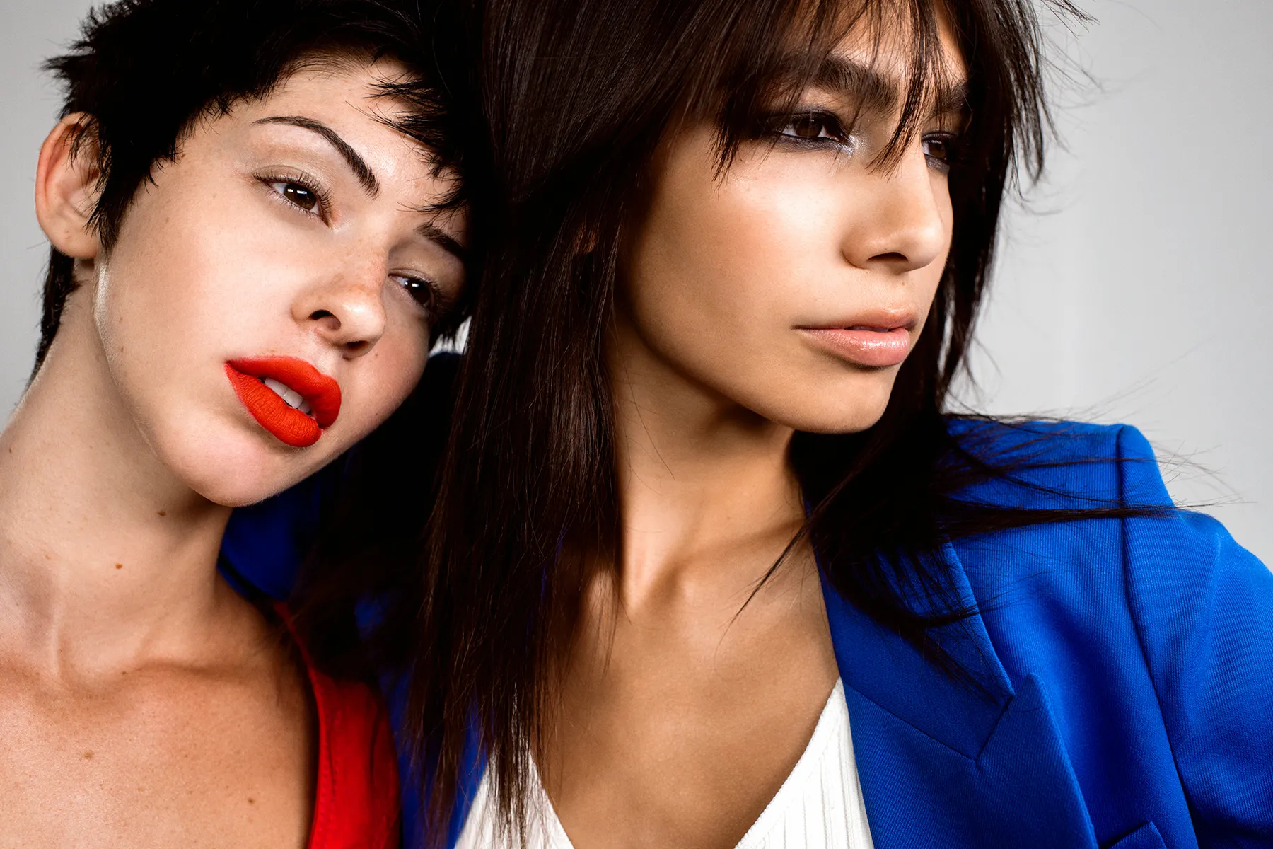 Two models with bold color and styling from a Frankie campaign shoot